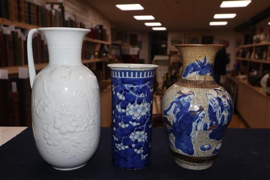 A blue and white sleeve vase, a Chinese crackleware vase and a Kaiser vase tallest 26cm